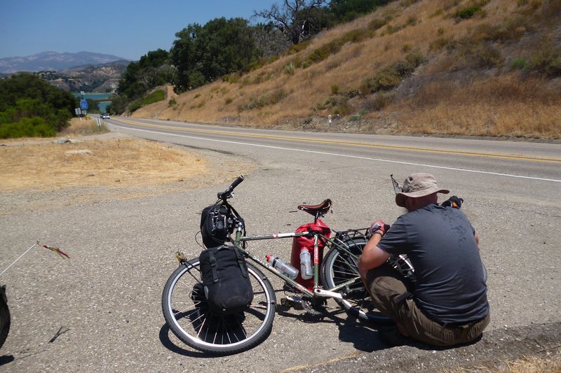 fixing broken spoke while cycle touring