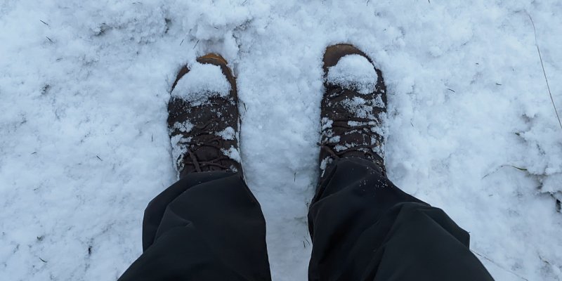 my legs and vivo boots standing in snow