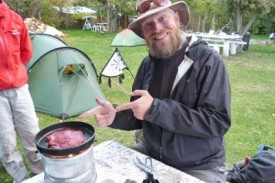 cooking steak on camping stove